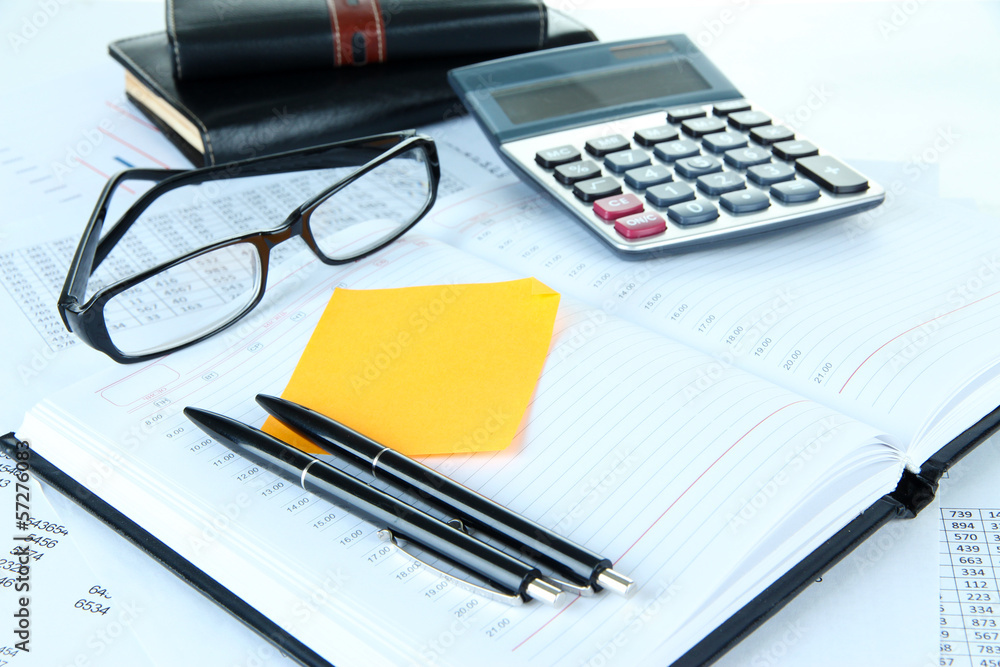 Office supplies with documents close up Office supplies with documents close up