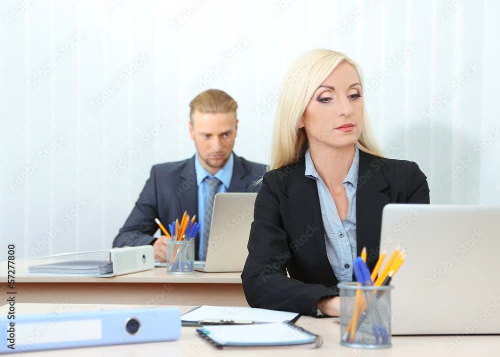 Office workers in workplace Office workers in workplace