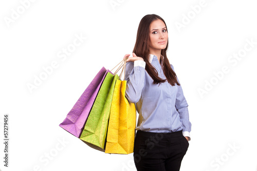 Portrait of young happy smiling woman with shopping bags, isolat