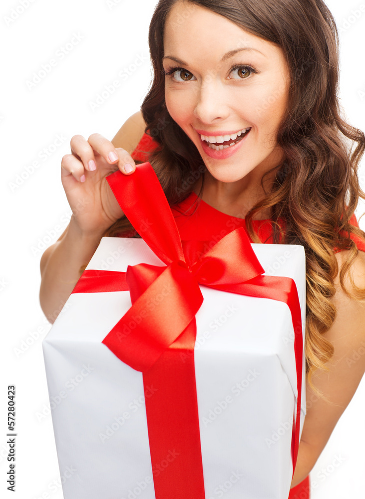 smiling woman in red dress with gift box smiling woman in red dress with gift box