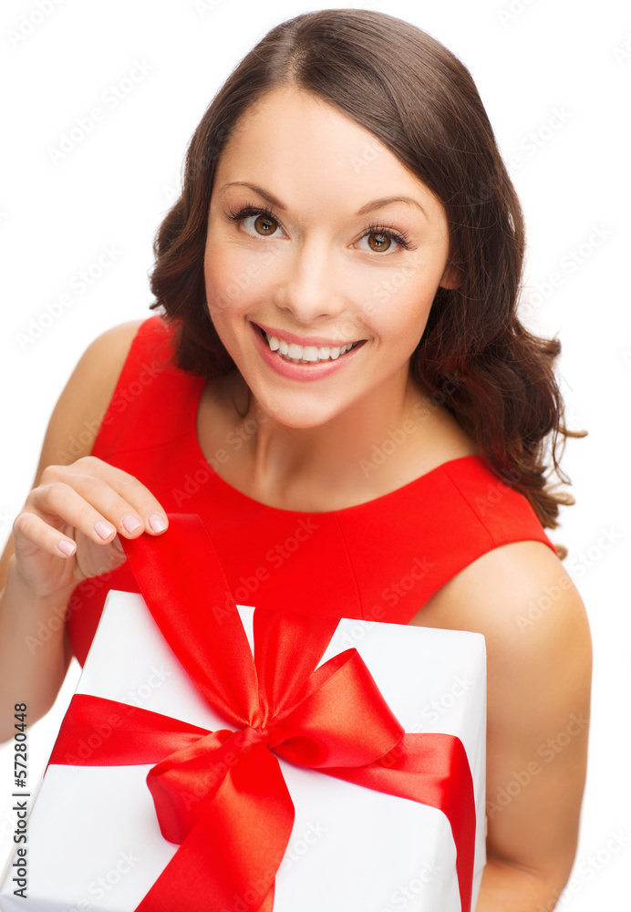 smiling woman in red dress with gift box smiling woman in red dress with gift box