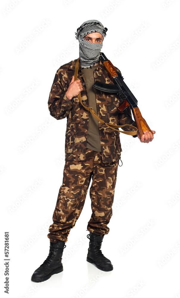 Arab nationality in camouflage suit and keffiyeh with automatic Arab nationality in camouflage suit and keffiyeh with automatic