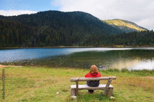 Relaxing near a mountain lake