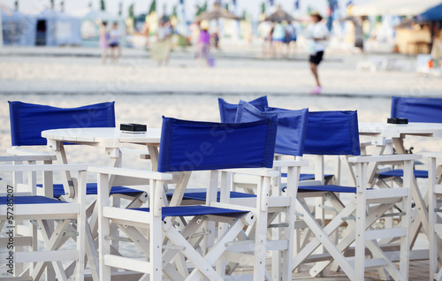 blue chairs on beach © Dragos Iliescu