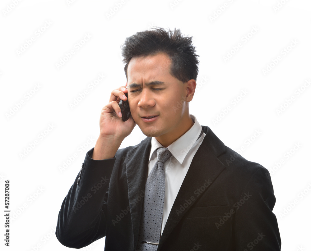 Businessman getting angry during call Businessman getting angry during call