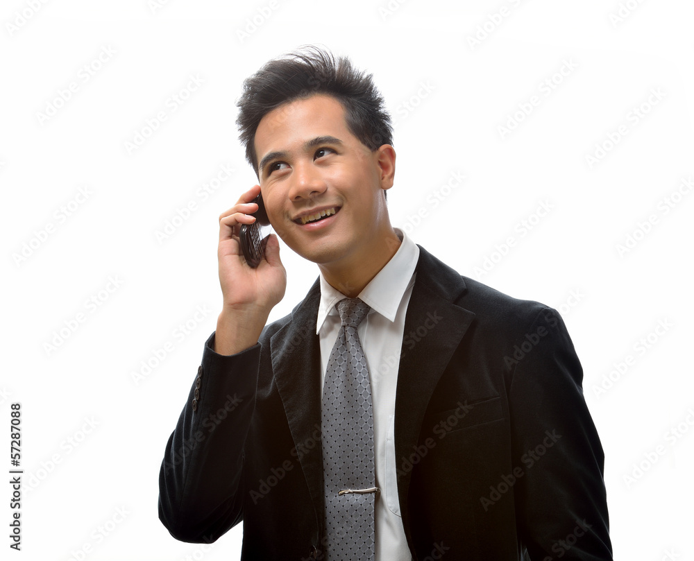 Business man talking on the mobile phone on white background Business man talking on the mobile phone on white background