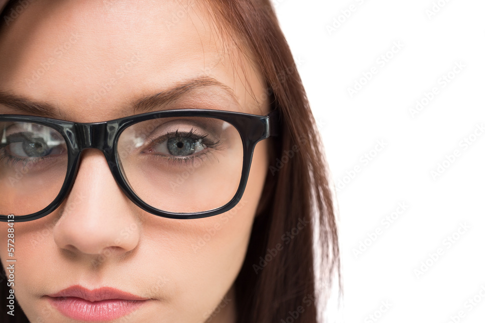Close up on serious brunette with glasses posing Close up on serious brunette with glasses posing