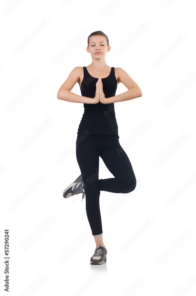 Fototapeta premium Young woman doing exercises on white