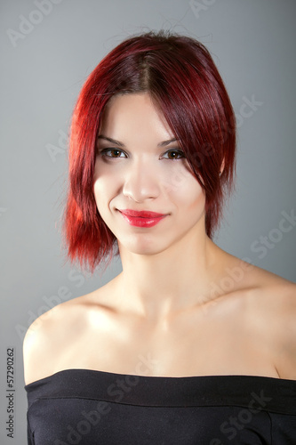 portrait of beautiful woman with red hair