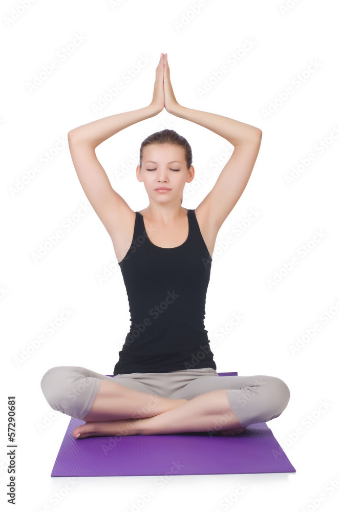 Young female doing exercises on white