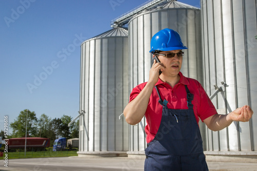 Worker at the silo copany photo