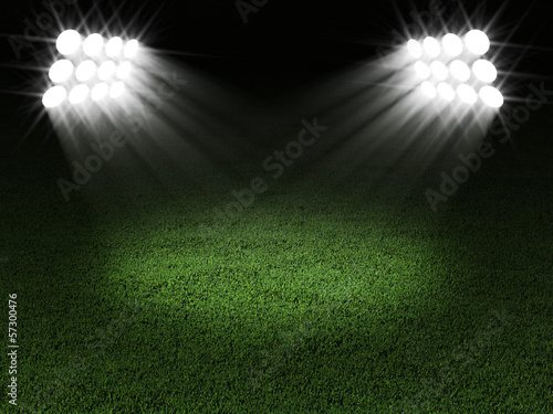 Green Soccer Field Illuminated by Spotlights