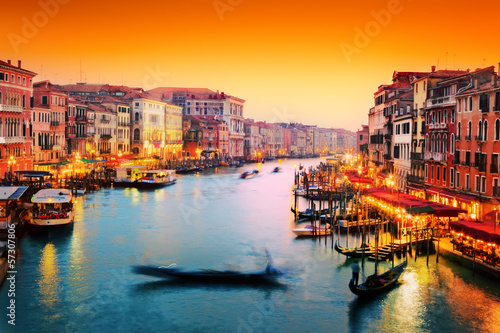 Venice  Italy. Gondola floats on Grand Canal at sunset