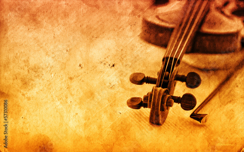 Classic violin on grunge paper background