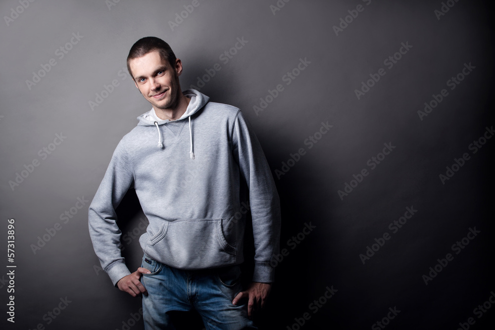 young man on a gray background