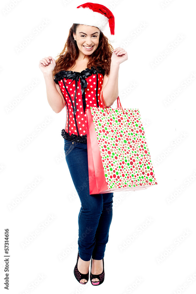Excited shopaholic woman in trendy attire