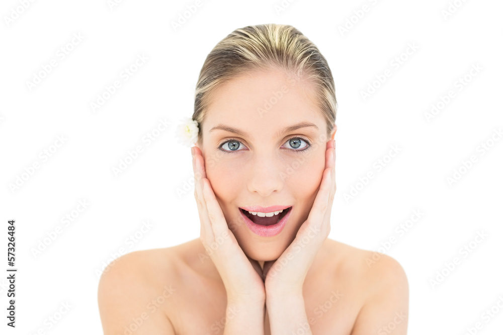 Astonished fresh blonde woman holding her head Astonished fresh blonde woman holding her head