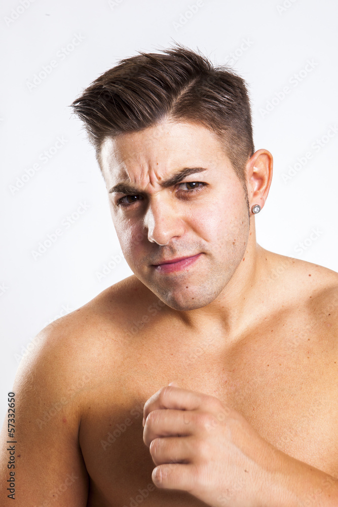 expression of a young fit man in white background expression of a young fit man in white background
