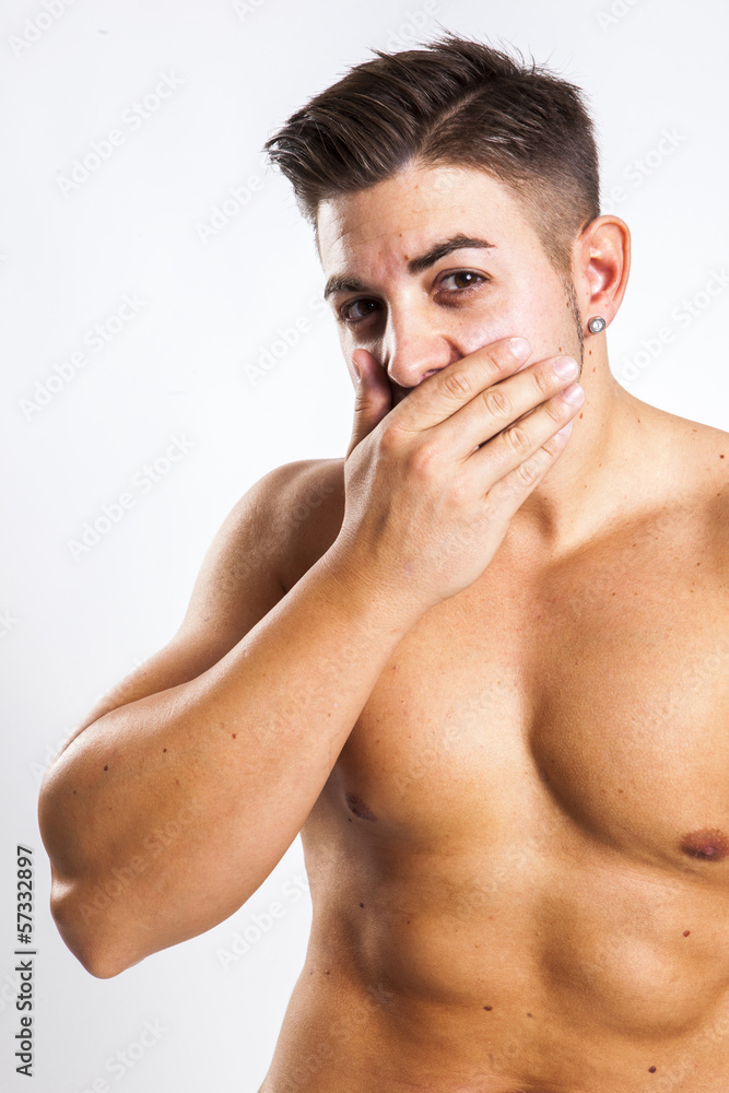 expression of a young fit man in white background expression of a young fit man in white background