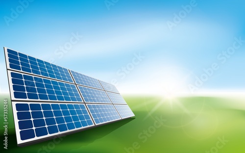 Solar panels in a field of grass