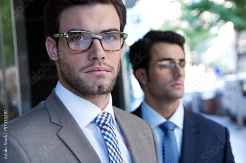 Two young executives arriving at the hotel