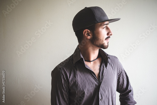 young stylish man with sport hat