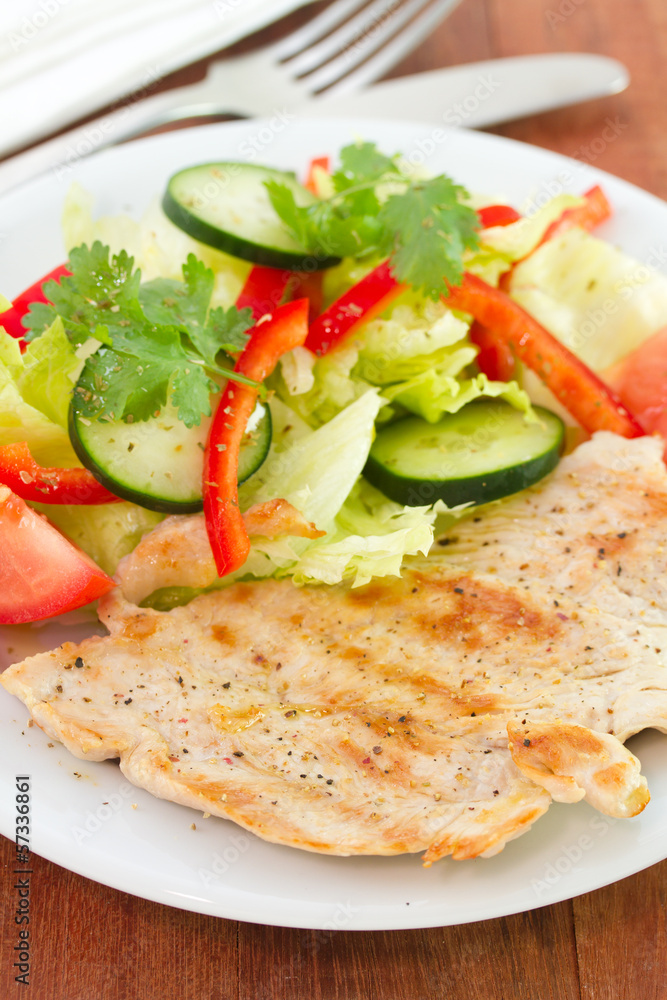 grilled turkey with vegetables on plate grilled turkey with vegetables on plate