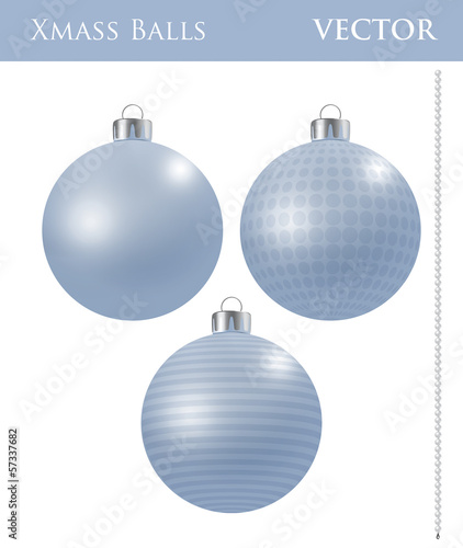 A set of light blue Christmas balls with different ornaments
