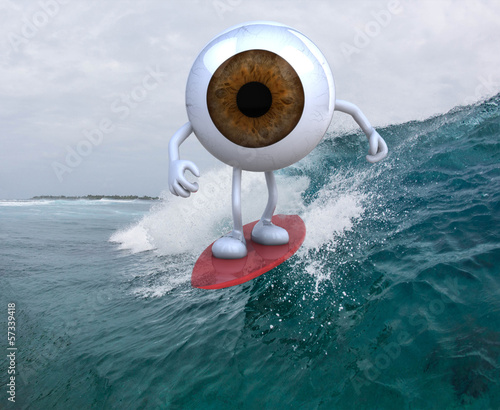 Photography eyeball with arms and legs surfing on the sea