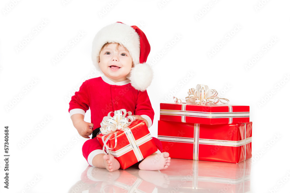 Cheerful little Santa Claus with presents. Cheerful little Santa Claus with presents.