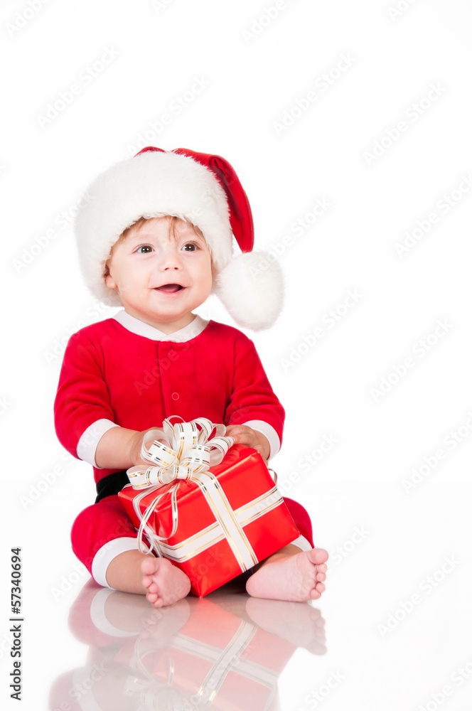 Cheerful little Santa Claus with presents. Cheerful little Santa Claus with presents.