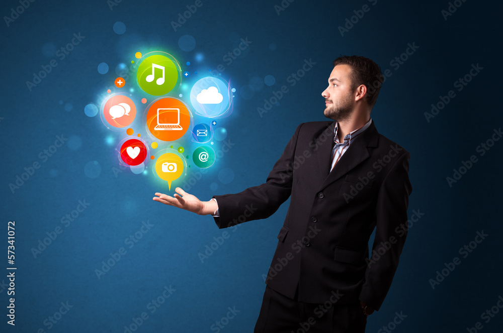 Multimedia icons in the hand of a businessman Multimedia icons in the hand of a businessman