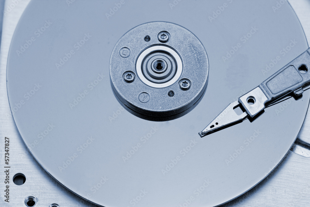Open computer hard drive on white background Open computer hard drive on white background