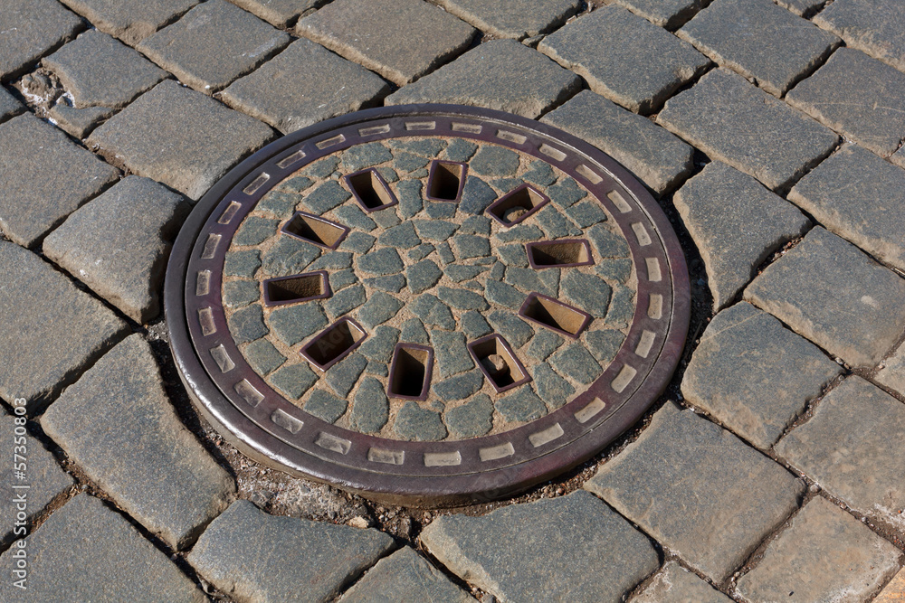manhole on pavement