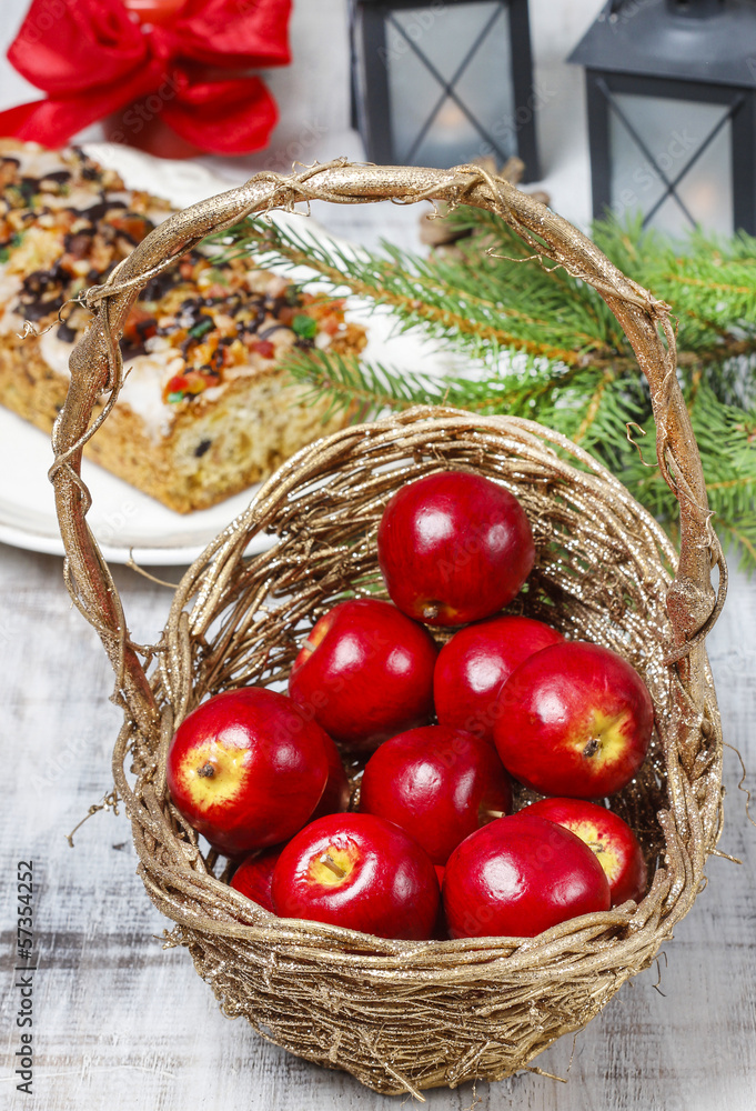 Basket of red apples on wooden table Basket of red apples on wooden table