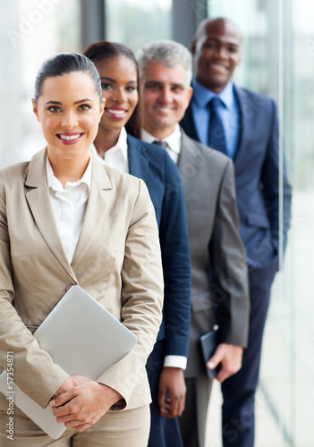 group of business executives standing in a row