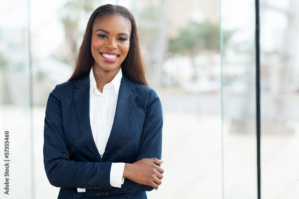african american corporate worker standing in office african american corporate worker standing in office