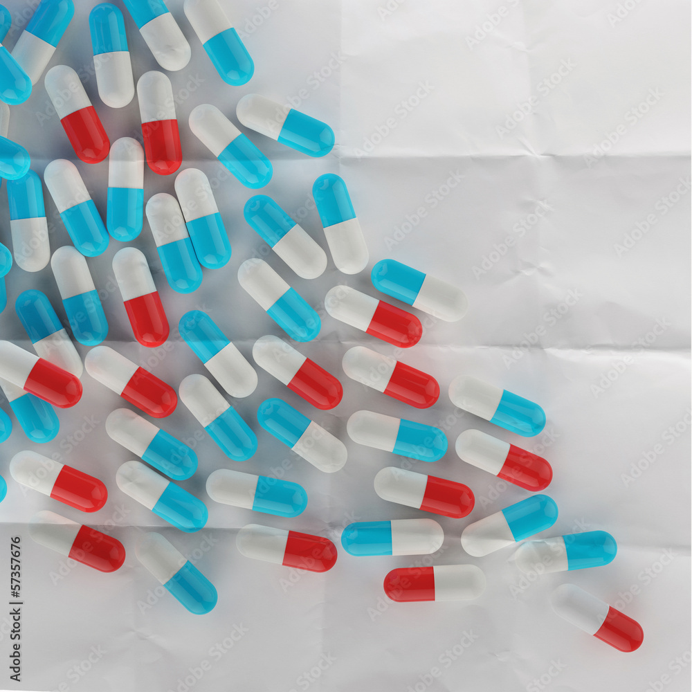 Pills spilling out of pill bottle Pills spilling out of pill bottle