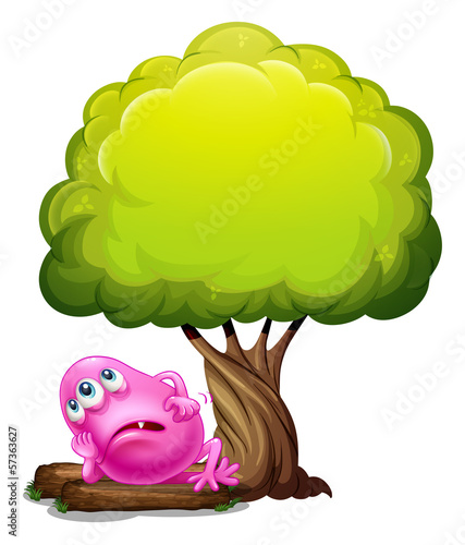 A fat pink beanie monster resting under the giant tree