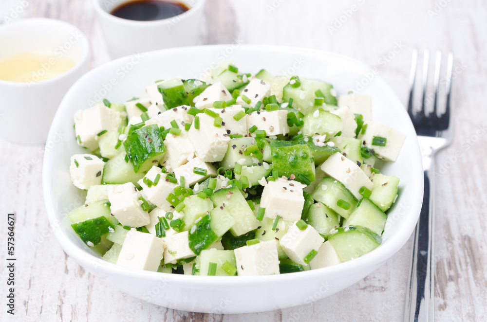 salad with cucumber, tofu, chives and sesame seeds salad with cucumber, tofu, chives and sesame seeds