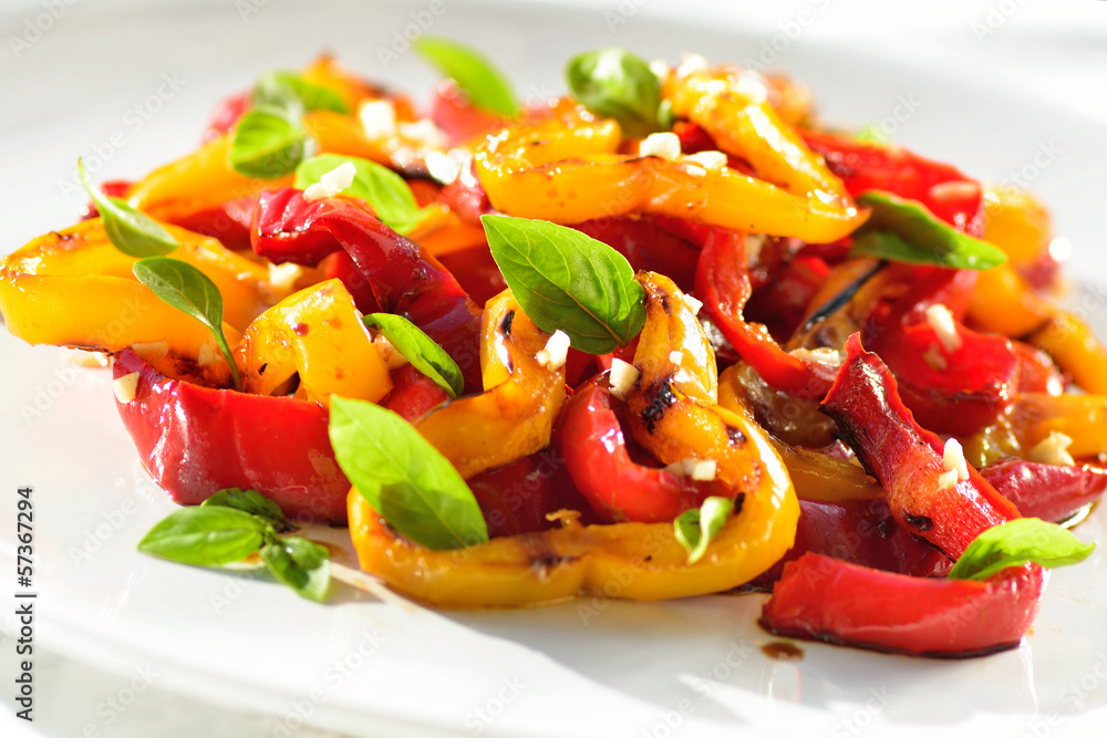 Roasted vegetables salad on white plate.Restaurant food Roasted vegetables salad on white plate.Restaurant food