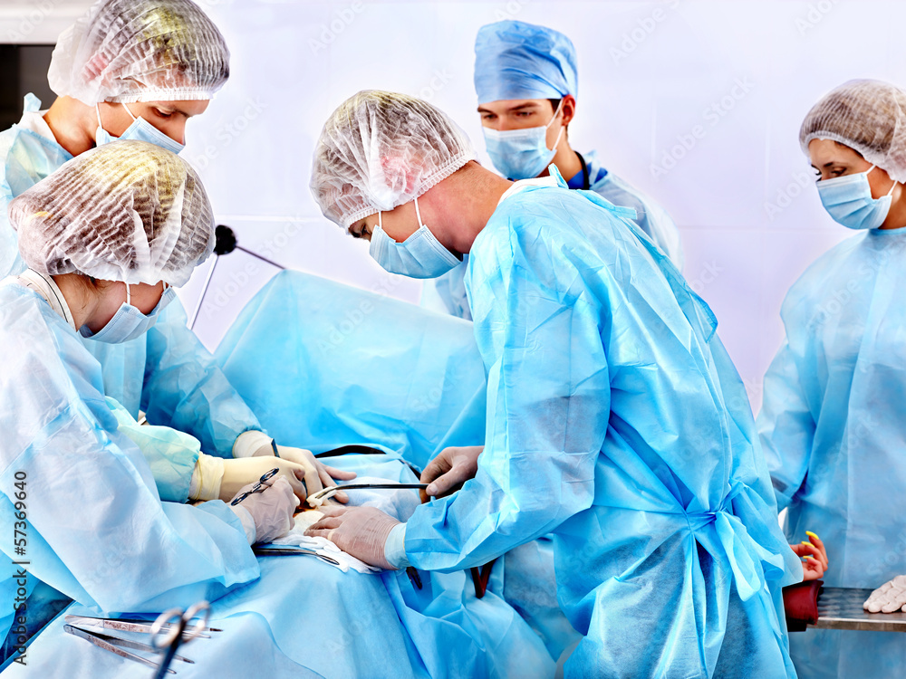 Surgeon at work in operating room. Surgeon at work in operating room.