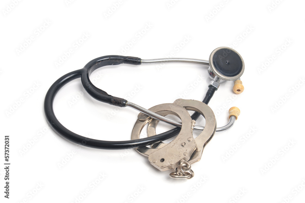 Stethoscope and handcuffs Stethoscope and handcuffs