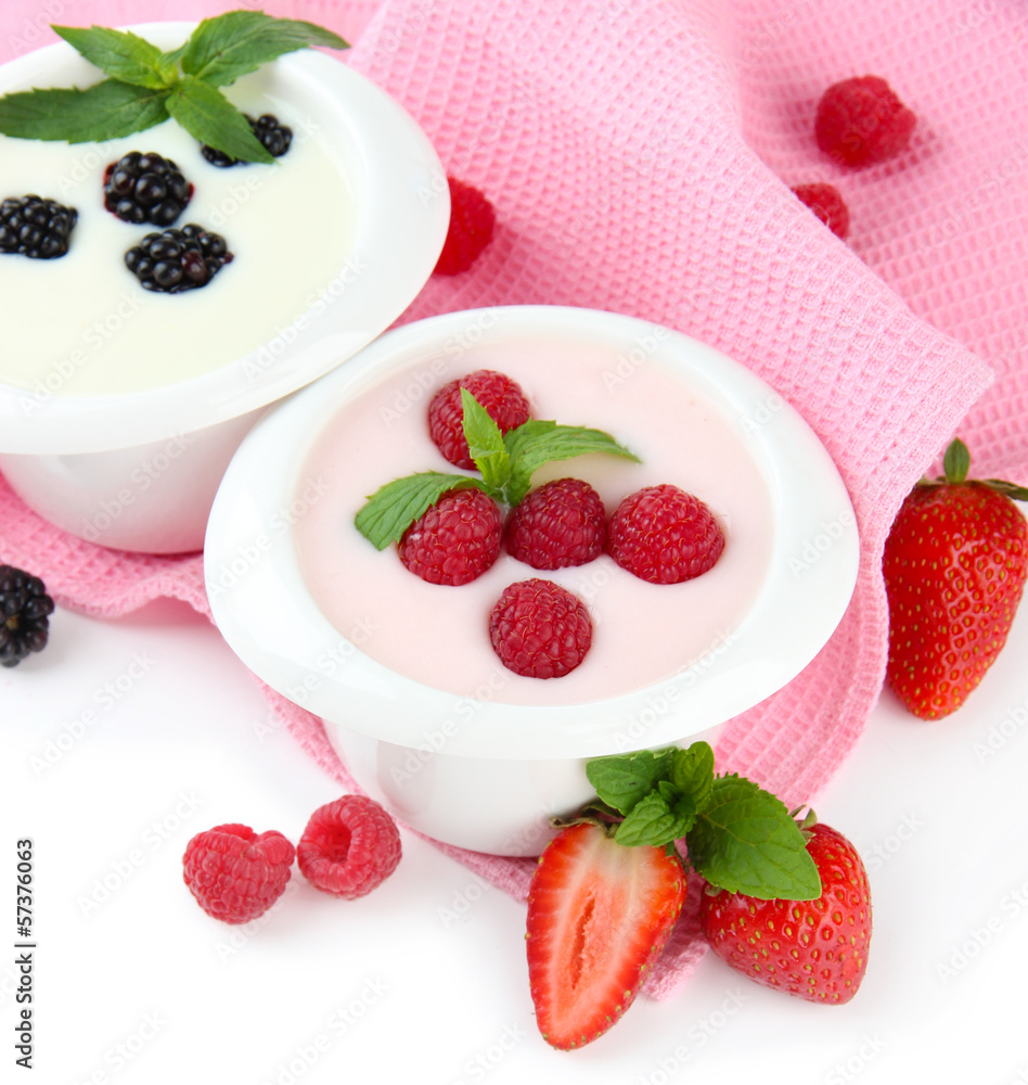 Delicious yogurt with berries isolated on white Delicious yogurt with berries isolated on white