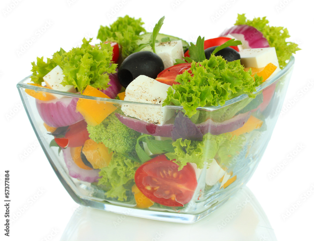 Greek salad on plate isolated on white Greek salad on plate isolated on white