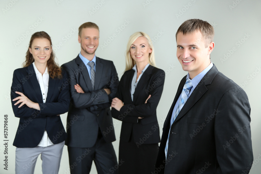 Group of business people on gray background Group of business people on gray background
