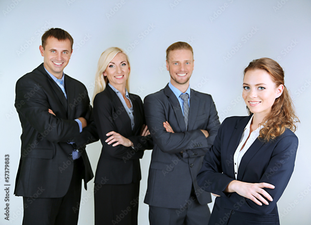 Group of business people on gray background Group of business people on gray background