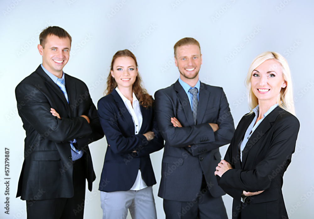 Group of business people on gray background