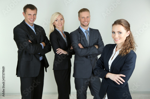 Group of business people on gray background