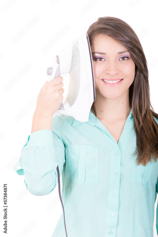 Happy young beautiful woman ironing clothes. Housework